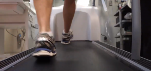Close up of tennis shoes / test patient walking on treadmill